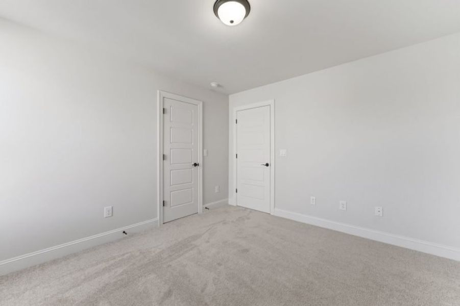Spacious, unfurnished interior of a new home in Blacksmith, Stokesdale (Image 80).