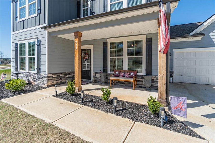 Exterior details and patio area of a home in River Station, Monroe (Image 26).