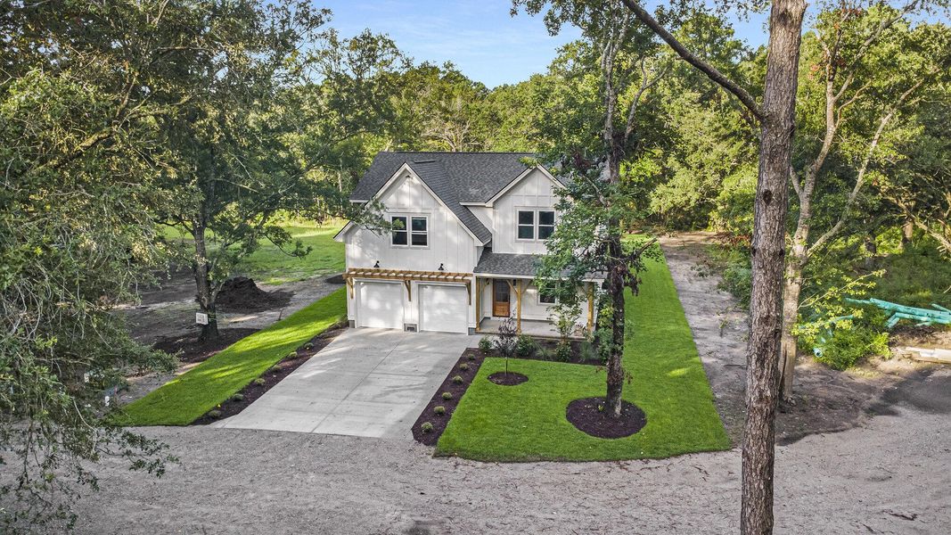 Front exterior of a new home in , Awendaw, SC, highlighting curb appeal (Image 18). Front exterior of a new home in , Awendaw, SC, highlighting curb appeal (Image 18).
