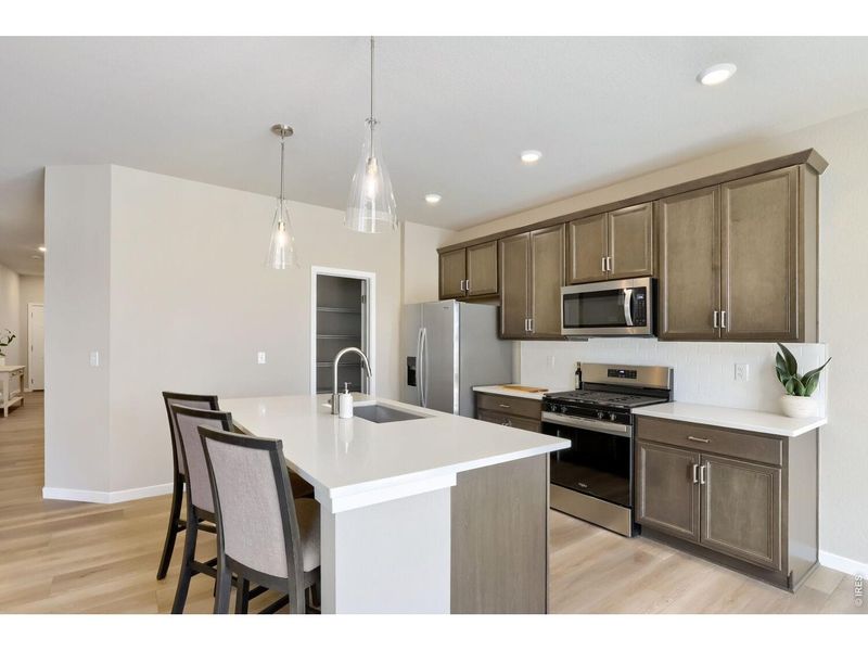 Furnished interior view inside a new home in Farmstead, Berthoud (Image 7).