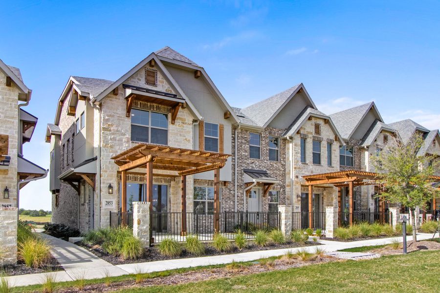 Front exterior of a new home in The Tribute, The Colony, TX, highlighting curb appeal (Image 2). Front exterior of a new home in The Tribute, The Colony, TX, highlighting curb appeal (Image 2).