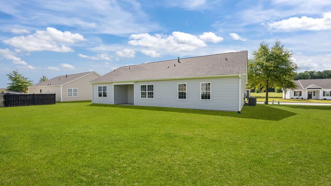 Front exterior of a new home in Tyler - Home on the Lake, New Bern, NC, highlighting curb appeal (Image 19).
