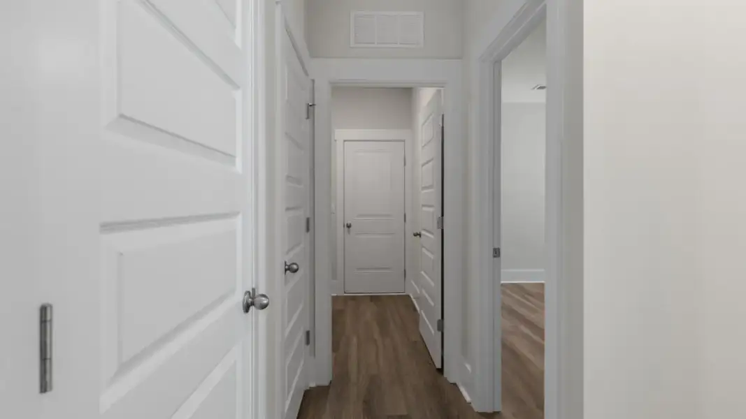 Spacious, unfurnished interior of a new home in The Retreat at Indigo Preserve Townhomes, Leland (Image 25).