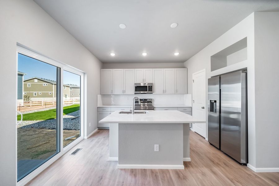 Furnished interior view inside a new home in Green Valley Ranch, Aurora (Image 7).