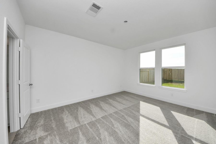 Spacious, unfurnished interior of a new home in The Canopies, Splendora (Image 20).