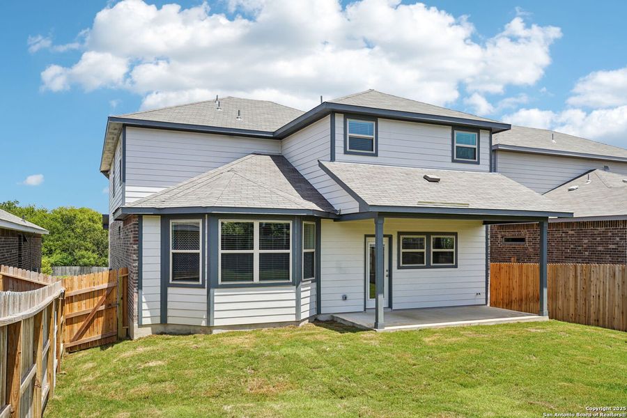 Front exterior of a new home in Comanche Ridge, San Antonio, TX, highlighting curb appeal (Image 28). Front exterior of a new home in Comanche Ridge, San Antonio, TX, highlighting curb appeal (Image 28).