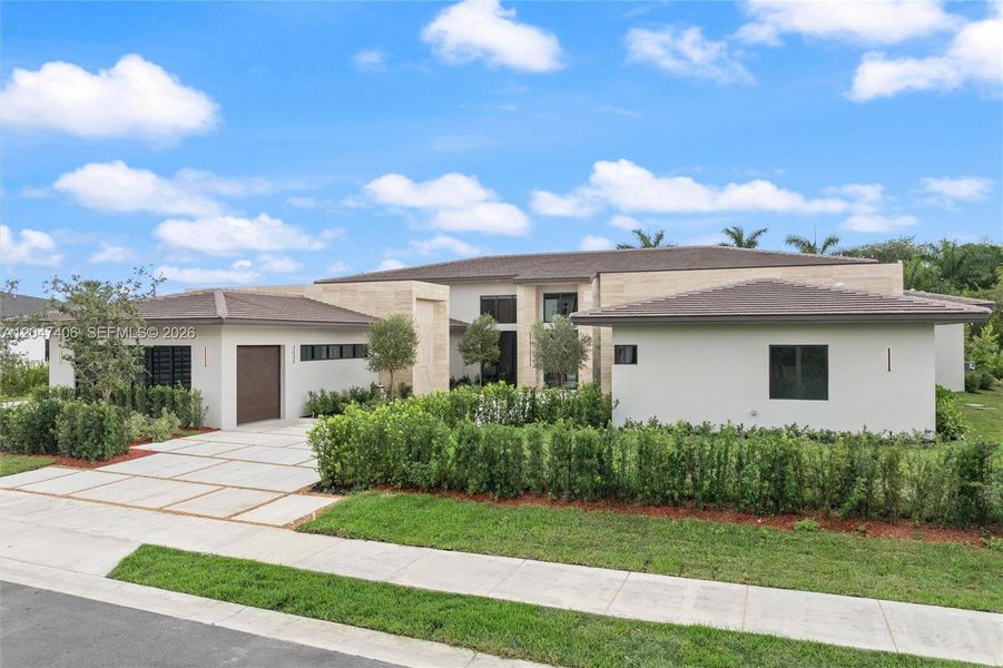 Front exterior of a new home in , Davie, FL, highlighting curb appeal (Image 22).