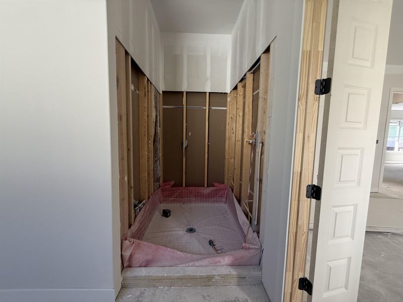 Bathroom featuring a tub to relax in
