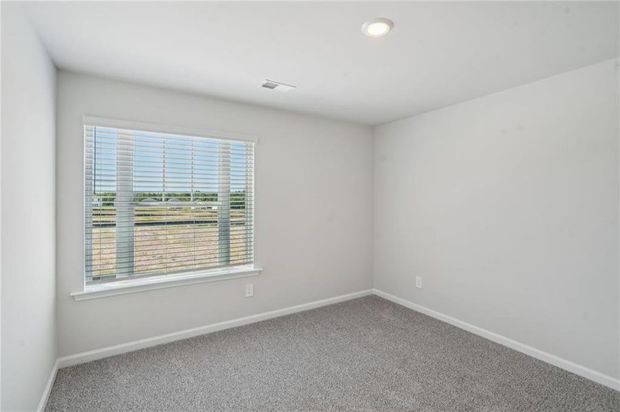 Spacious, unfurnished interior of a new home in Avalon - Parc Series, Conyers (Image 13). Spacious, unfurnished interior of a new home in Avalon - Parc Series, Conyers (Image 13).