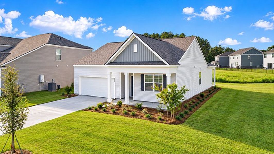 Front exterior of a new home in Pine Hills at Cane Bay, Summerville, SC, highlighting curb appeal (Image 2).