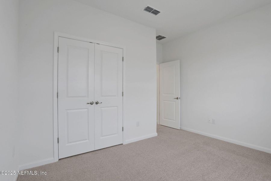 Spacious, unfurnished interior of a new home in Silver Landing at SilverLeaf, St. Augustine (Image 27).