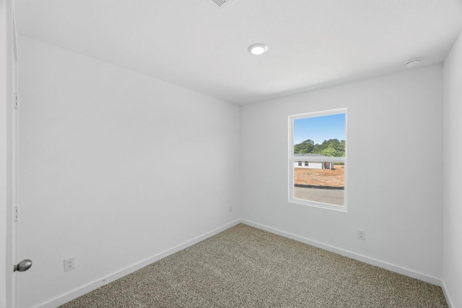 Spacious, unfurnished interior of a new home in Baron Village, Conroe (Image 13). Spacious, unfurnished interior of a new home in Baron Village, Conroe (Image 13).