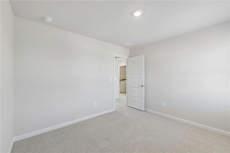 Spacious, unfurnished interior of a new home in Hemingway - Reserve Series, Cumming (Image 35).