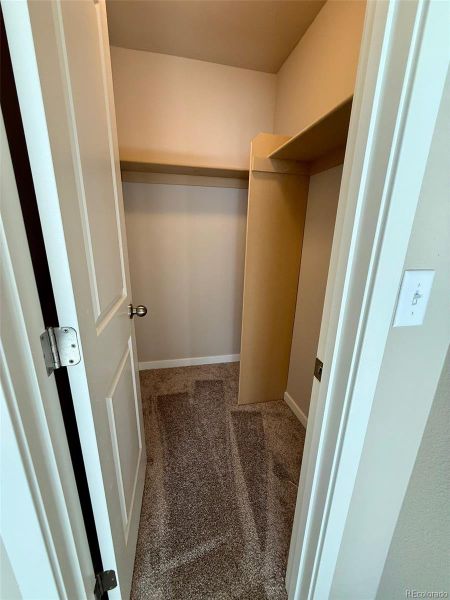 Spacious, unfurnished interior of a new home in Sky Ranch - Highland Collection, Watkins (Image 13).