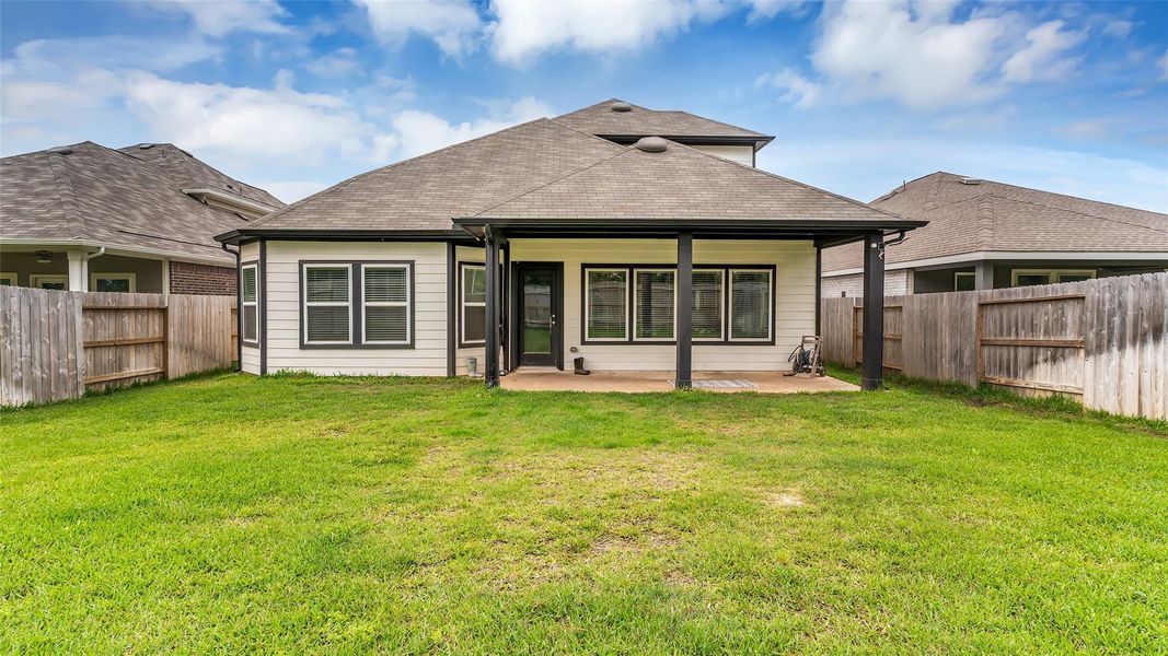 Your family will Enjoy the large fenced backyard with covered patio