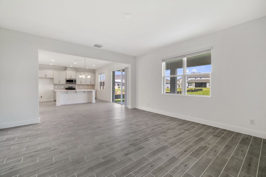 Representative unfurnished interior of a home built from the Newcastle by Risewell Homes in Park View at the Hills, Minneola (Image 9).
