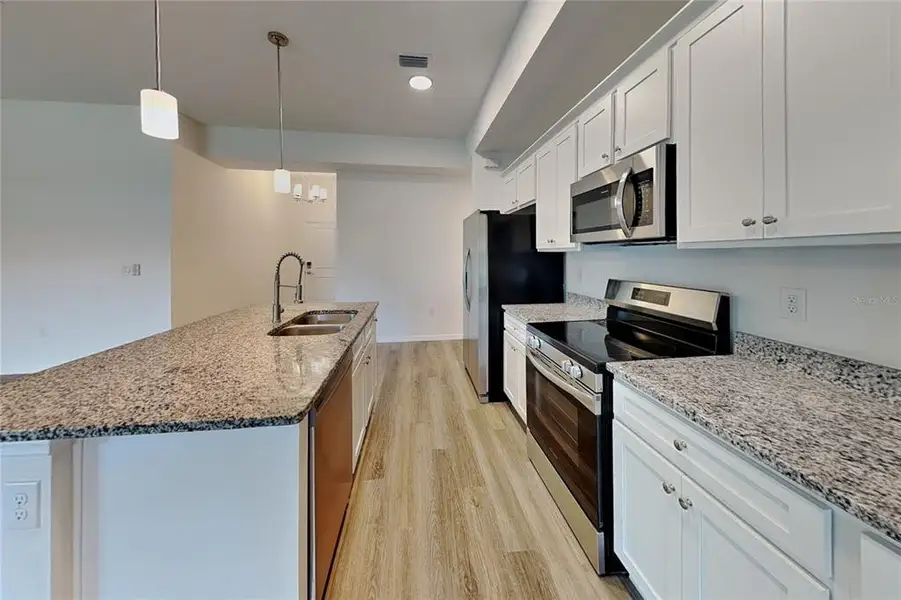 Furnished interior view inside a new home in , Port Charlotte (Image 3).