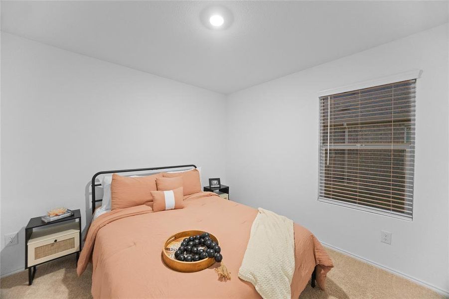 Furnished interior view inside a new home in Mobberly Farms: Watermill Collection, Pilot Point (Image 16).