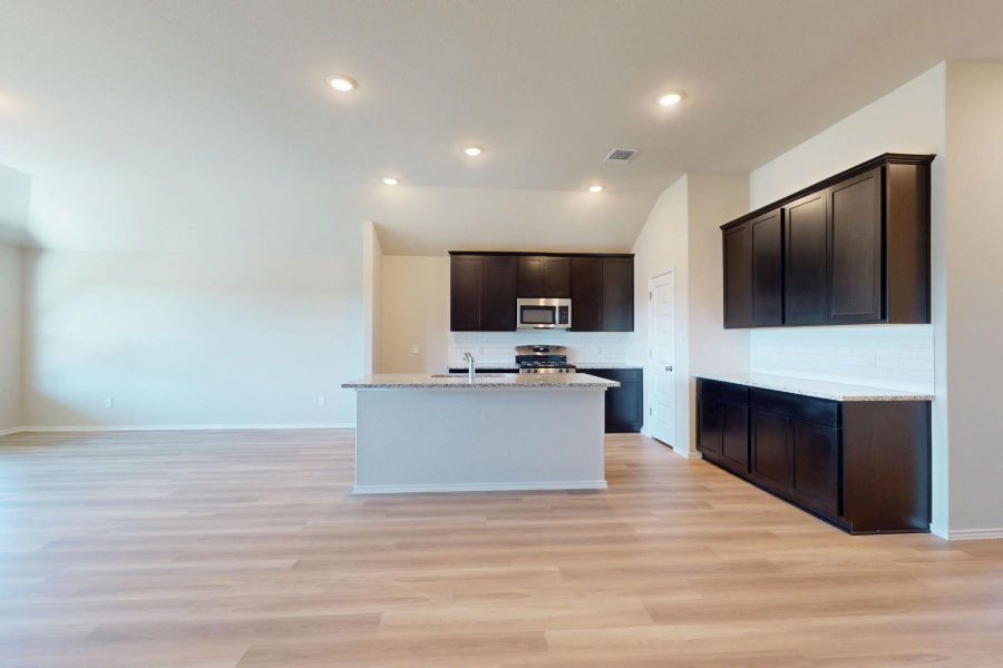 Furnished interior view inside a new home in Carillon, Manor (Image 8).