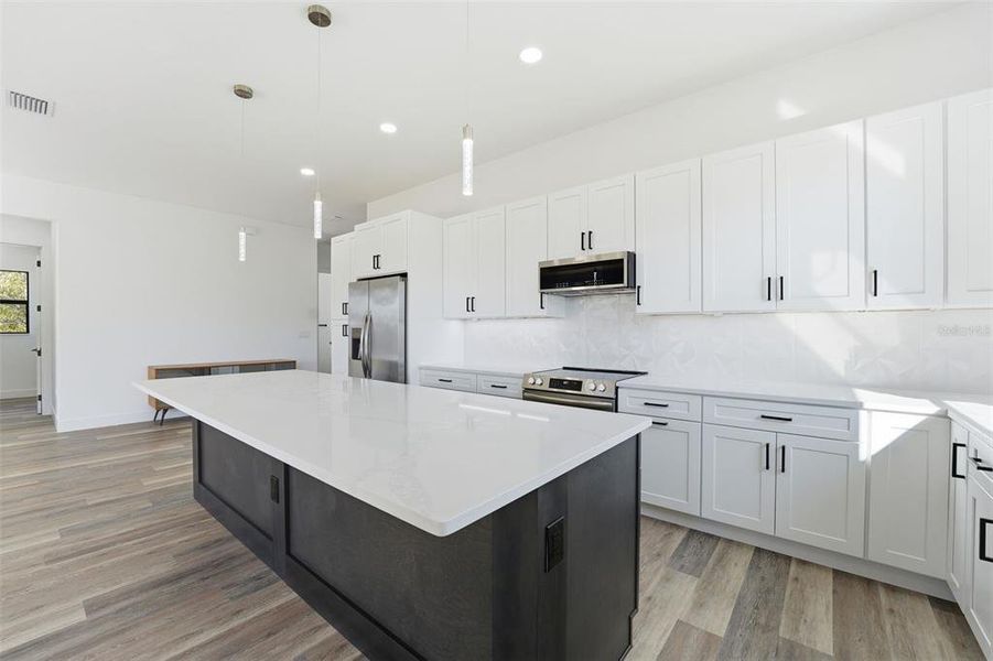 Furnished interior view inside a new home in , Port Charlotte (Image 12).