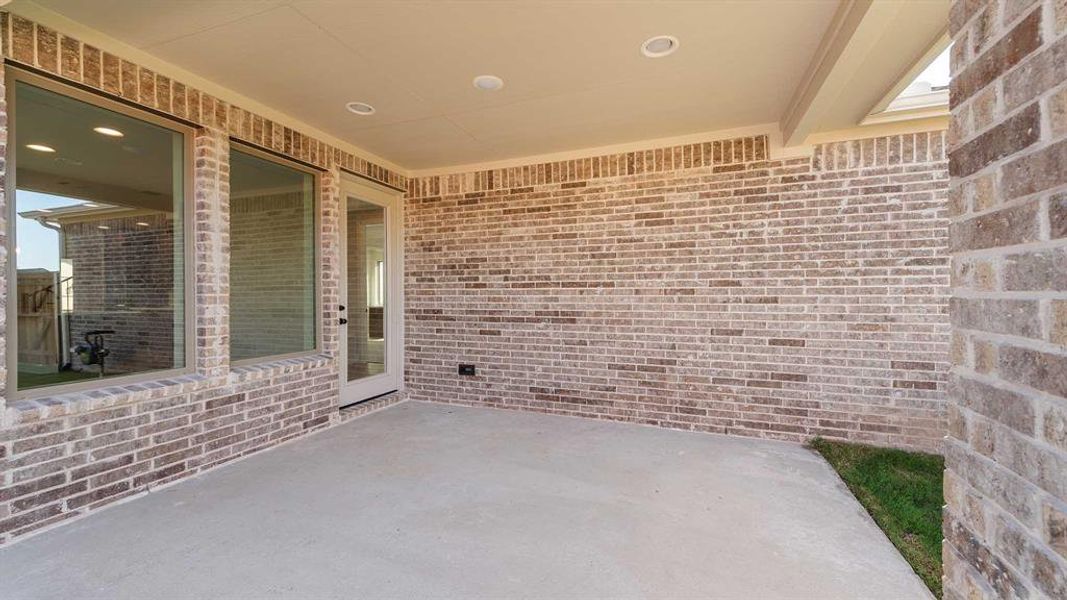 Exterior details and patio area of a home in The Parks At Wilson Creek 40', Celina (Image 2).