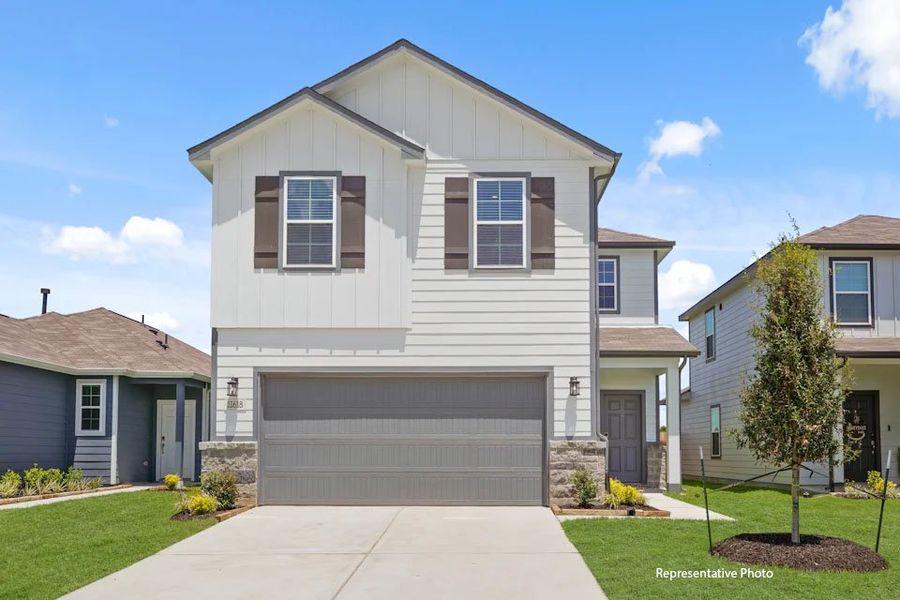 A house with a garage. A house with a garage.