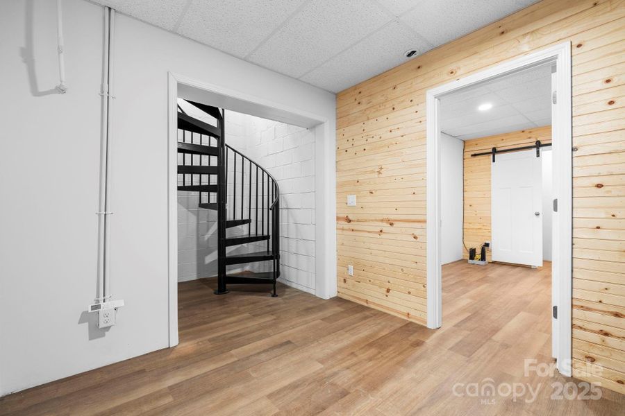 Spiral Staircase leading downstairs to the full finished basement.