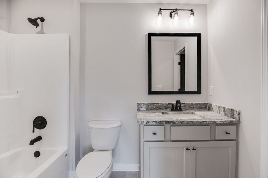 Furnished interior view inside a new home in LOVVORN ESTATES, Carrollton (Image 30).