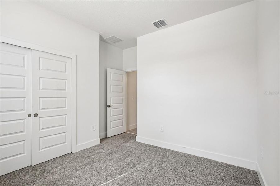 Spacious, unfurnished interior of a new home in Magnolia Bay - Reserve Series, Nokomis (Image 18). Spacious, unfurnished interior of a new home in Magnolia Bay - Reserve Series, Nokomis (Image 18).