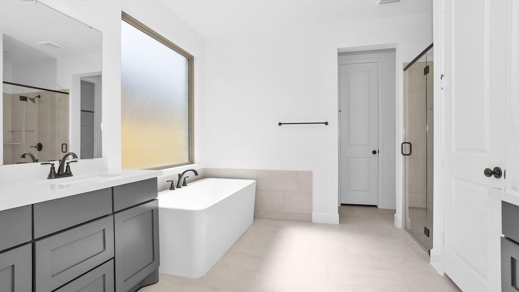 Furnished interior view inside a new home in Elyson 55', Katy (Image 3).