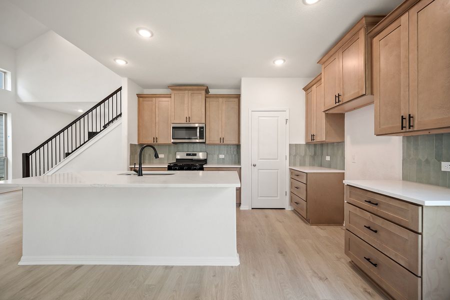 Furnished interior view inside a new home in The Hills of Bear Creek, Manchaca (Image 8).