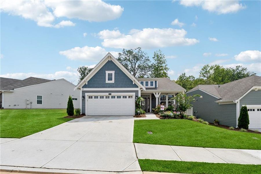 Front exterior of a new home in Poplar Place, Dallas, GA, highlighting curb appeal (Image 20).