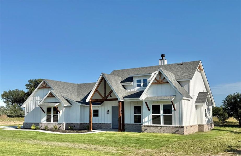 Front exterior of a new home in , Weatherford, TX, highlighting curb appeal (Image 10).
