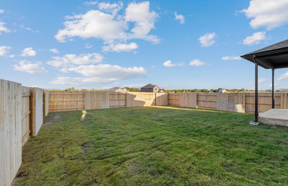 Exterior details and patio area of a home in Patterson Ranch, Georgetown (Image 26).
