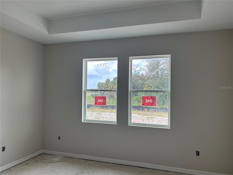 In-progress construction of a new home in Oakfield Trails Signature, Parrish, FL (Image 28).