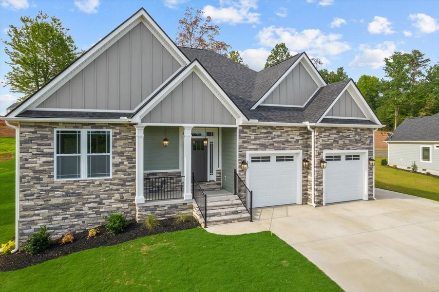 Representative exterior photo of a completed home built from the Roosevelt Elite by Enchanted Homes in Lakeside at Blue Ridge Plantation, Taylors, SC (Image 21). Representative exterior photo of a completed home built from the Roosevelt Elite by Enchanted Homes in Lakeside at Blue Ridge Plantation, Taylors, SC (Image 21).