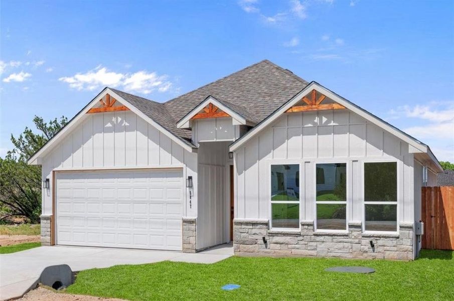Front exterior of a new home in , Granbury, TX, highlighting curb appeal (Image 17).