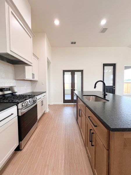 Furnished interior view inside a new home in TerraVista, Victoria (Image 6).
