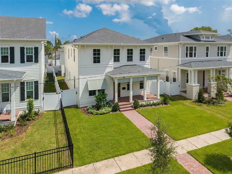 Front exterior of a new home in , St. Petersburg, FL, highlighting curb appeal (Image 28).