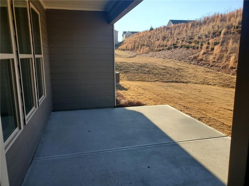 Exterior details and patio area of a home in Hellen Valley, Braselton (Image 2).
