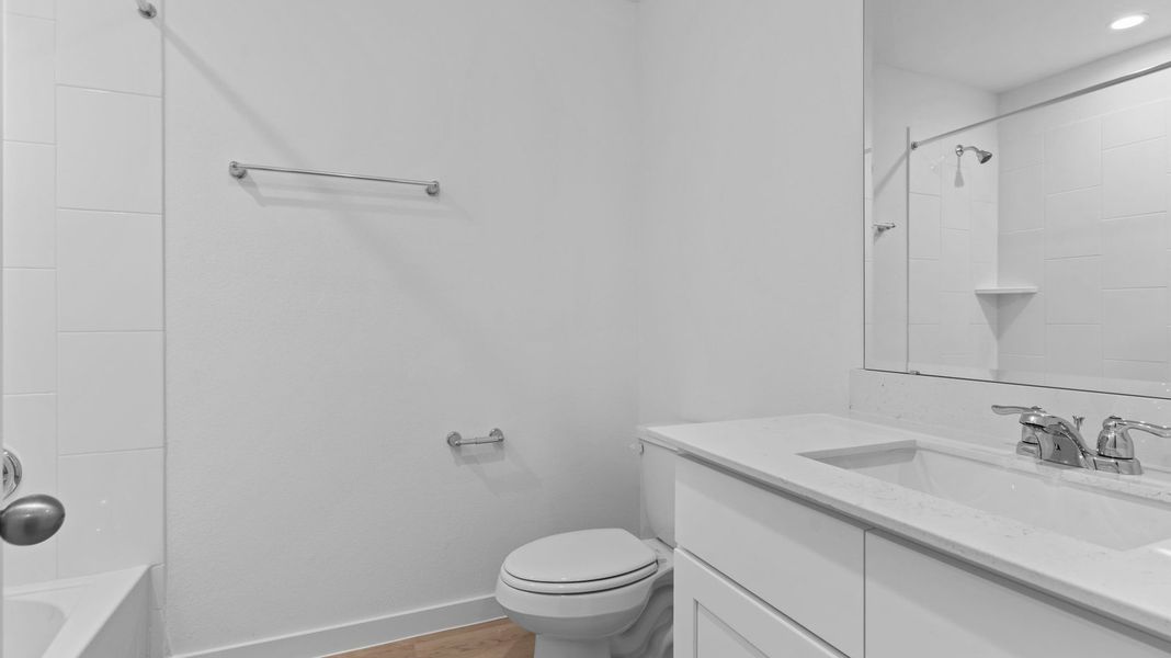 Furnished interior view inside a new home in Caldwell Crossing, Iowa Colony (Image 10).