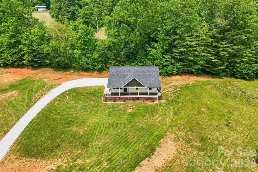 Front exterior of a new home in , Spruce Pine, NC, highlighting curb appeal (Image 1). Front exterior of a new home in , Spruce Pine, NC, highlighting curb appeal (Image 1).