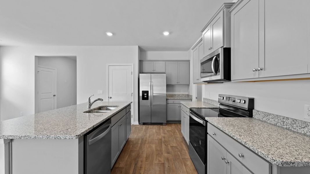 Representative furnished interior of a home built from the ROBIE by D.R. Horton in Hillcrest, Ravenel (Image 7).