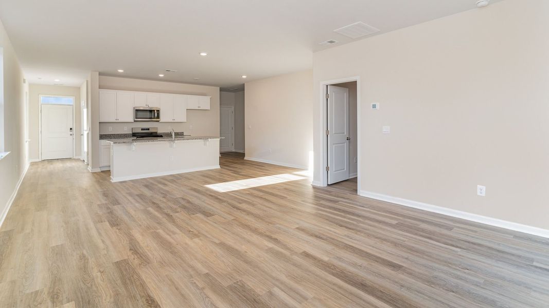Representative unfurnished interior of a home built from the WREN by D.R. Horton in Saltgrass Landing, Winnabow (Image 16).