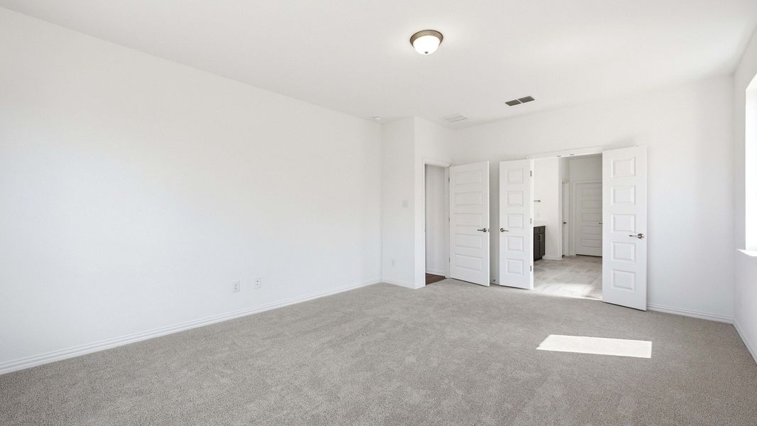 Furnished interior view inside a new home in Oaks at San Gabriel, Georgetown (Image 19).