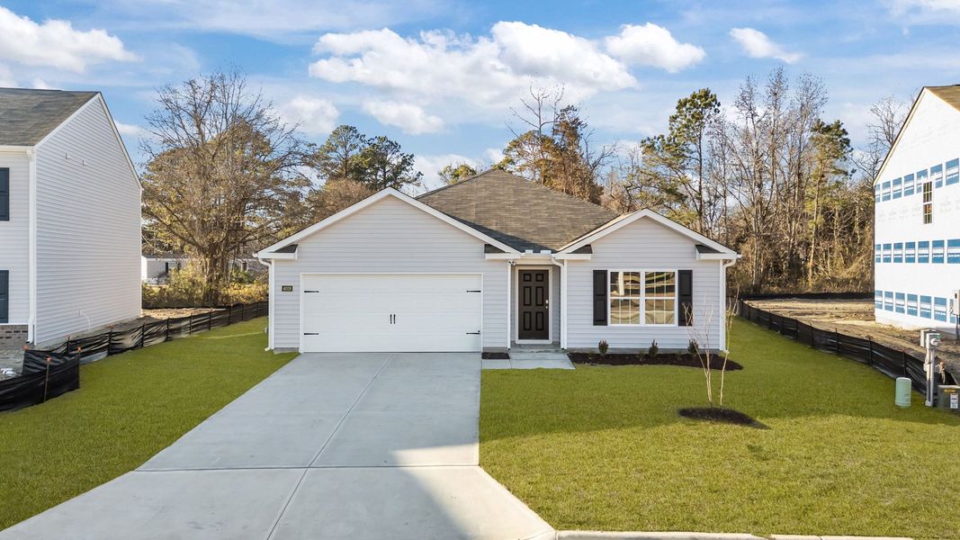 Front exterior of a new home in Madeline Farm, New Bern, NC, highlighting curb appeal (Image 16). Front exterior of a new home in Madeline Farm, New Bern, NC, highlighting curb appeal (Image 16).
