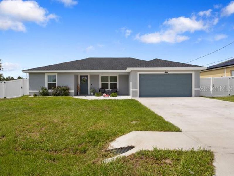 Front exterior of a new home in , Ocala, FL, highlighting curb appeal (Image 2).