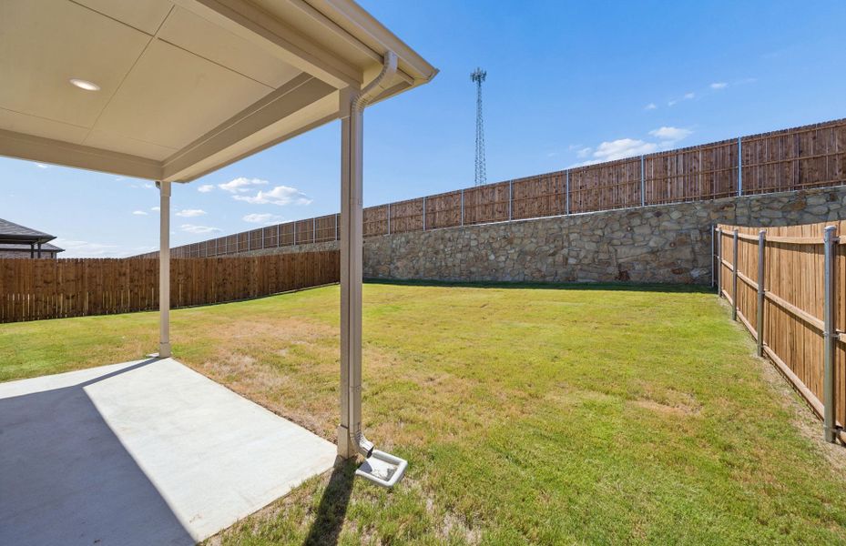 Exterior details and patio area of a home in Rosemary Fields, Godley (Image 3).