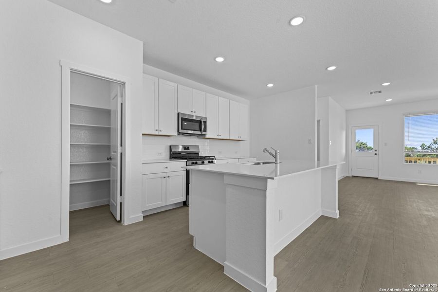 Furnished interior view inside a new home in Waterwheel: Coastline Collection, San Antonio (Image 6).