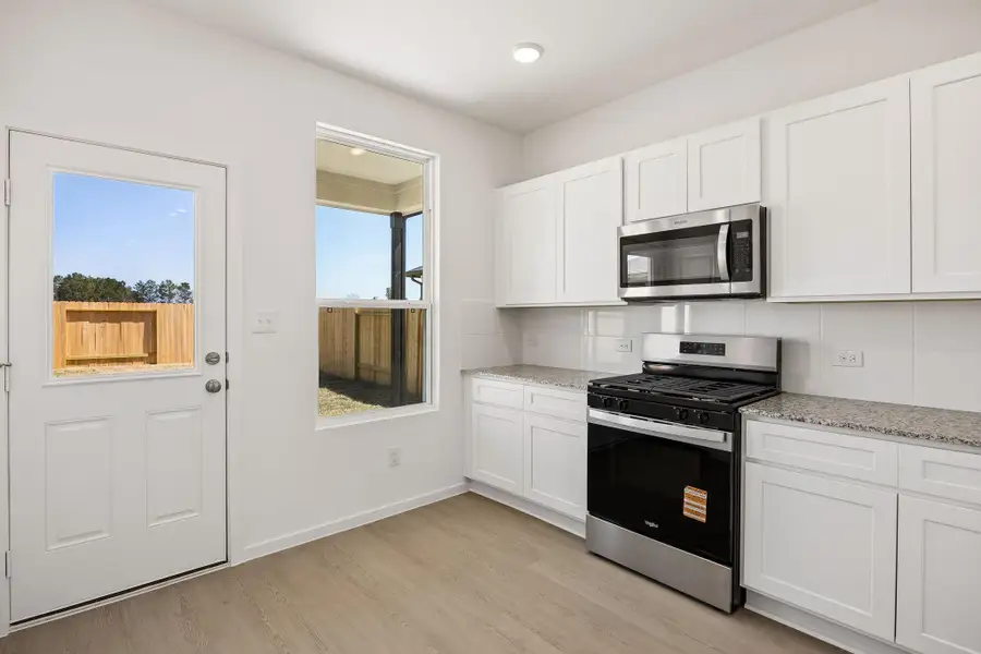 Furnished interior view inside a new home in Montgomery Bend, Montgomery (Image 5).